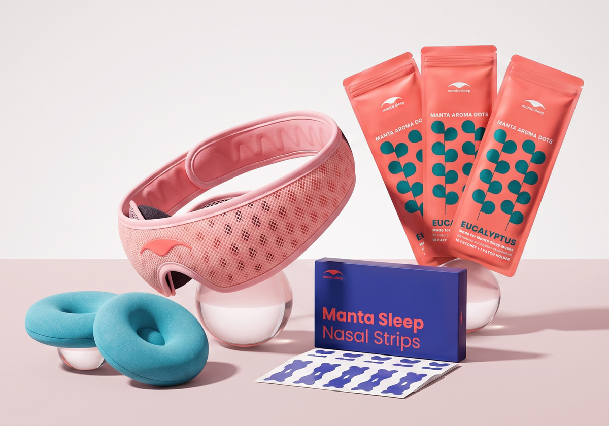 Manta Breathe Easy Bundle with pink PRO mask, blue COOL eye cups, aroma dots packets, and nasal strips.